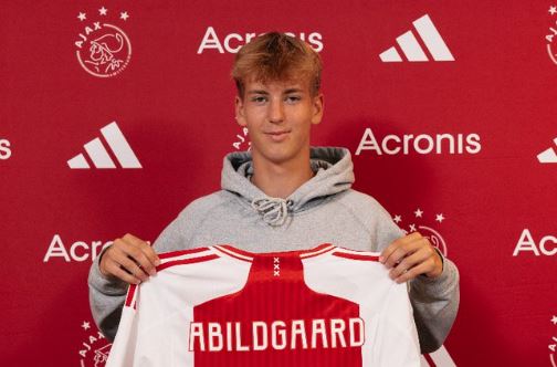 Lasse Abildgaard shows off his new Ajax shirt  (Picture: @AFCAjax)