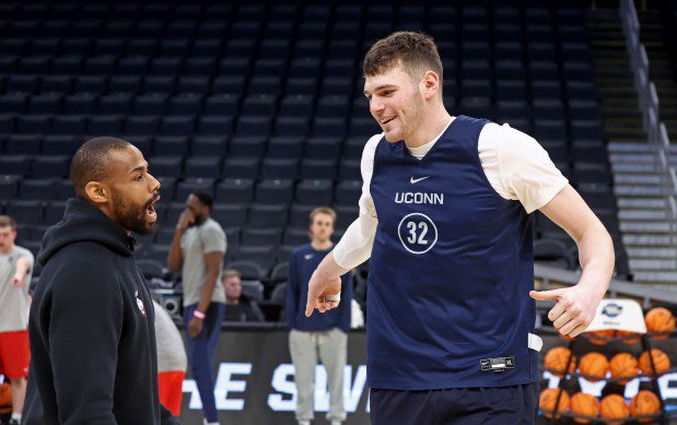 Connecticut Huskies center Donovan Clingan (32) warms up Wednesday at the TD Garden. On Thursday, UConn will play San Diego State in a Sweet 16 battle. (Staff Photo/Stuart Cahill/Boston Herald)