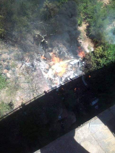 The wreckage of a bus after it crashed off a bridge, killing 45 passengers in South Africa with only one survivor. 