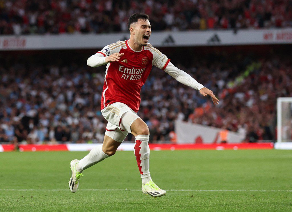 Soccer Football - Premier League - Arsenal v Manchester City - Emirates Stadium, London, Britain - October 8, 2023 Arsenal's Gabriel Martinelli celebrates scoring their first goal REUTERS/David Klein NO USE WITH UNAUTHORIZED AUDIO, VIDEO, DATA, FIXTURE LISTS, CLUB/LEAGUE LOGOS OR 'LIVE' SERVICES. ONLINE IN-MATCH USE LIMITED TO 45 IMAGES, NO VIDEO EMULATION. NO USE IN BETTING, GAMES OR SINGLE CLUB/LEAGUE/PLAYER PUBLICATIONS.