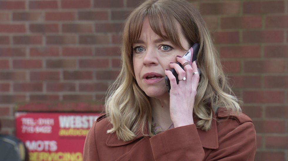 Toyah looks shocked on the phone in Coronation Street