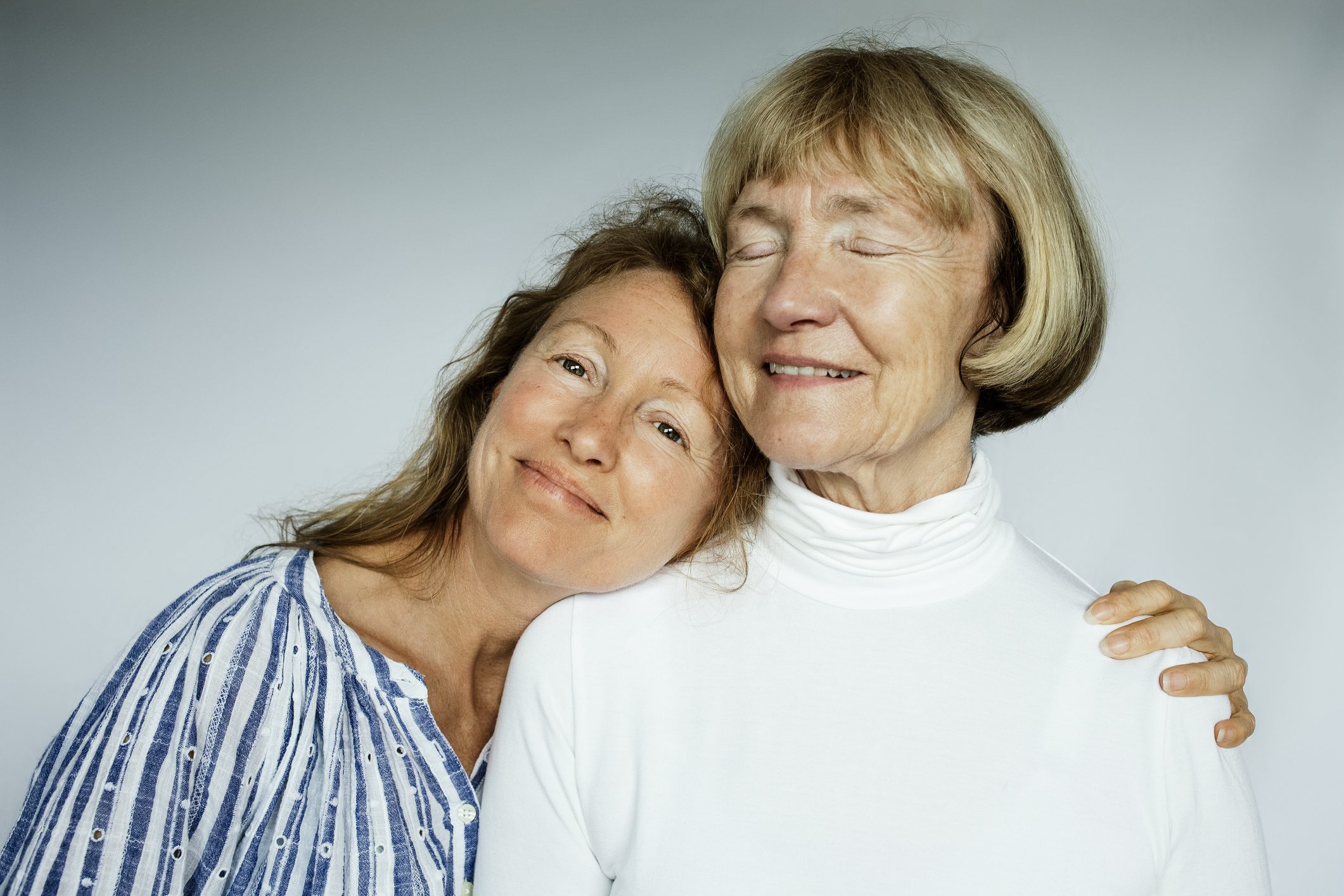 mother and daughter hugging