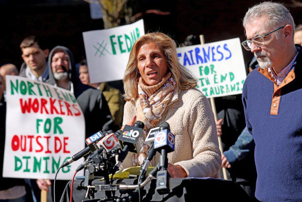 Carla Gomes and Jorge Mendoza speak during a press conference on outdoor dining in the North End. (Matt Stone/Boston Herald)