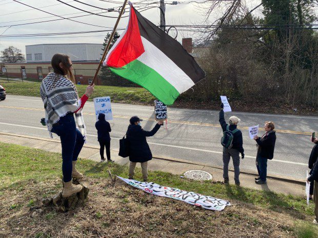 "Genocide Joe has got to go," say protesters out front of the school on Providence Road in Nether Providence. (PETE BANNAN-DAILY TIMES)