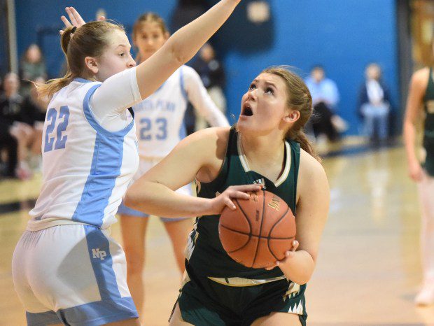 Emmaus' Cassie Doemling, 41, looks to go up for a shot as North Penn's Leah Mikulski, 22, defends during their PIAA-6A first round game on Friday, March 8, 2024. (Mike Cabrey/MediaNews Group)