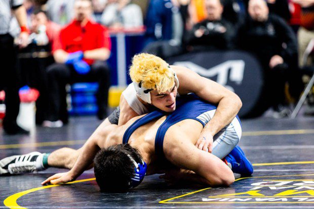 Pennridge's Sam Kuhns scores the winning takedown against Central Mountain's Griffin Walizer for fifth place at 152 pounds.  (Nate Heckenberger - For MediaNews Group)