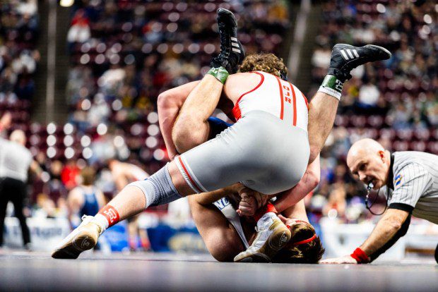 Owen J. Roberts' Dillon Bechtold pins Abington Heights' Caleb Marzolino in the 215-pound final. (Nate Heckenberger - For MediaNews Group)