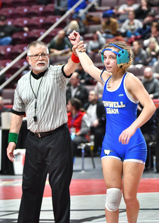 Conwell-Egan's Julia Horger gets her hand raised after winning the 106-pound state title (BILL RUDICK for MediaNews Group)