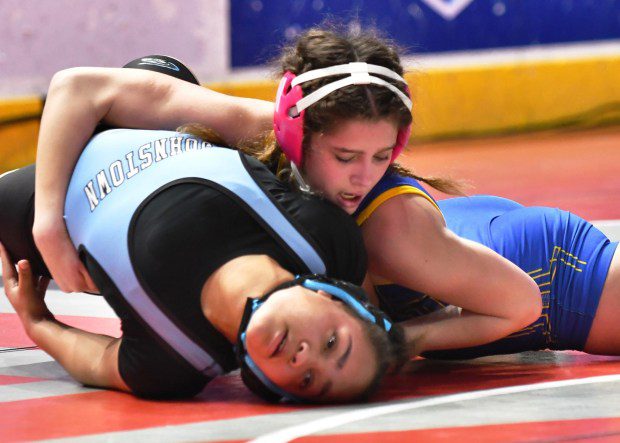 Downingtown West's Sienna Landrum looks for the pin in a semi-final win over Syonna Morris of Greater Johnstown (BILL RUDIVK for MediaNews Group)