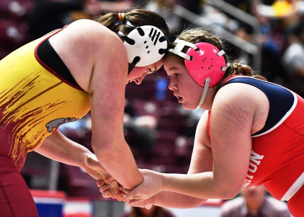 Souderton's MacKenna Atkinson ties up with Cumberland Valley's Aja'nai Johnson during a semi-final victory (BILL RUDIVK for MediaNews Group)