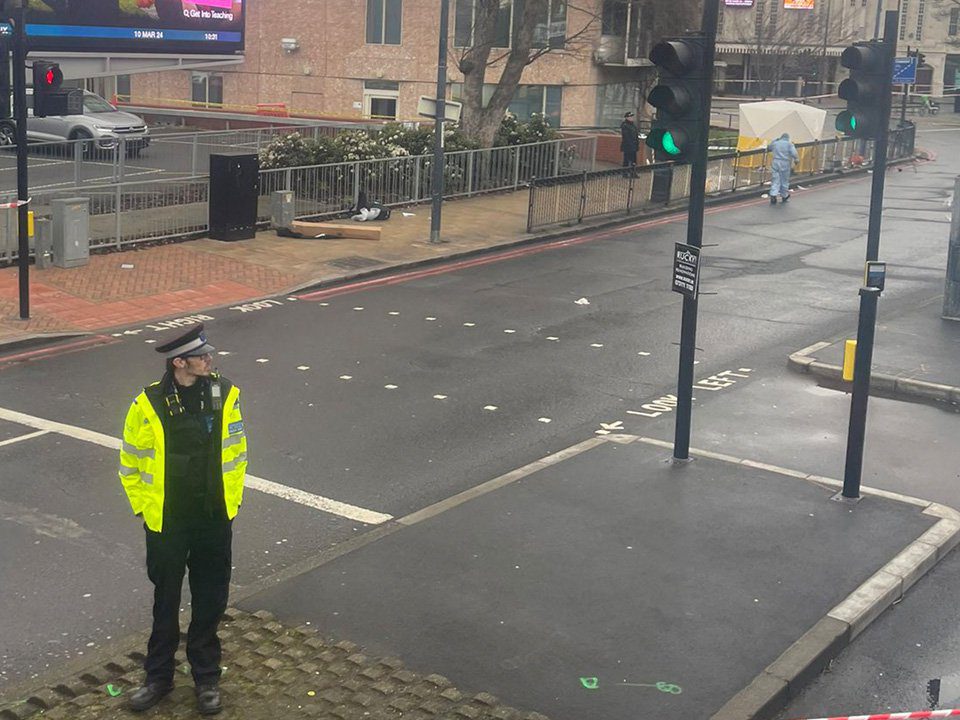 Photos from the scene show police and forensics officers