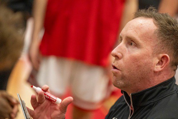 Parkland's head coach Eddie Ohlson talks with his team against Plymouth-Whitemarsh during a PIAA Class 6A first round game Saturday, March 9, 2024, at Parkland High School. (April Gamiz/The Morning Call)