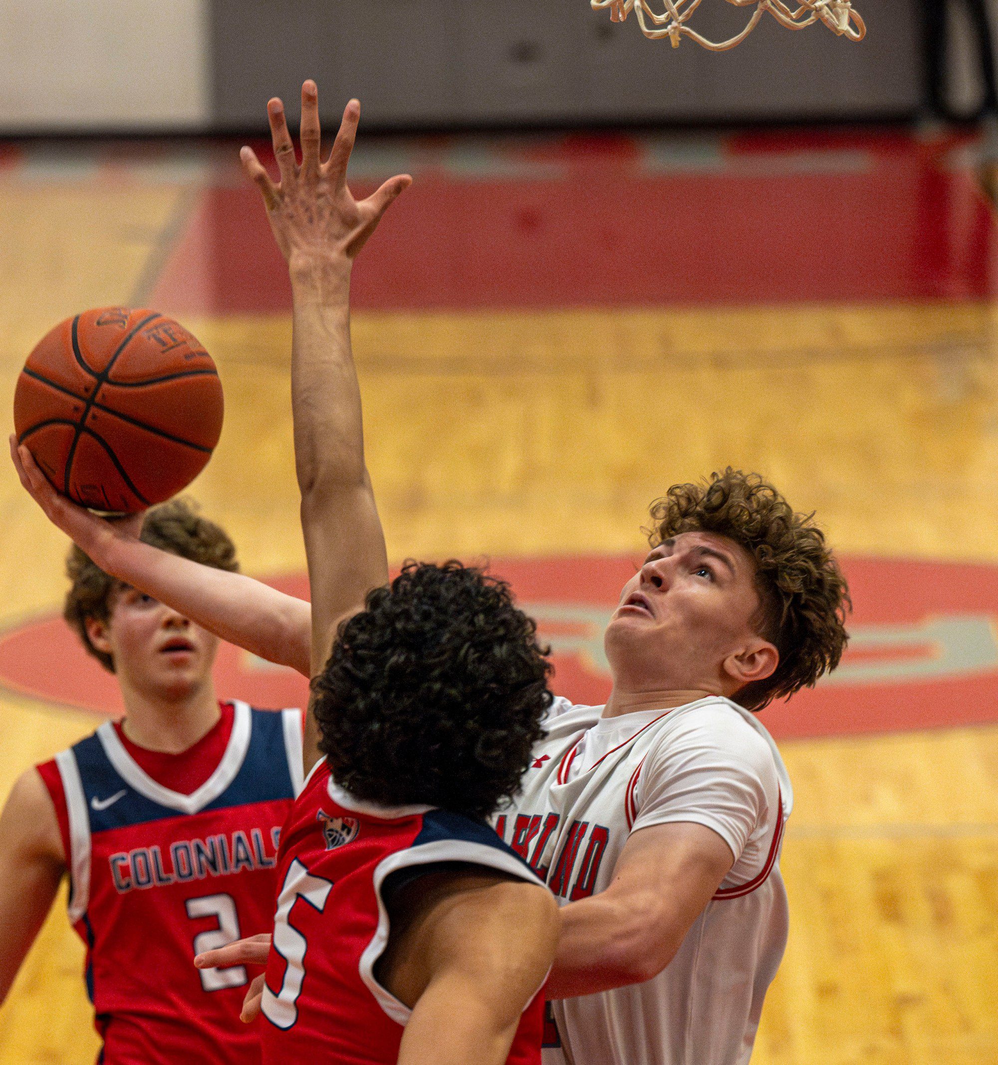 Parkland's Blake Nassry drives up the court against Plymouth-Whitemarsh's Mani Sajid during a PIAA Class 6A first round game Saturday, March 9, 2024, at Parkland High School. (April Gamiz/The Morning Call)