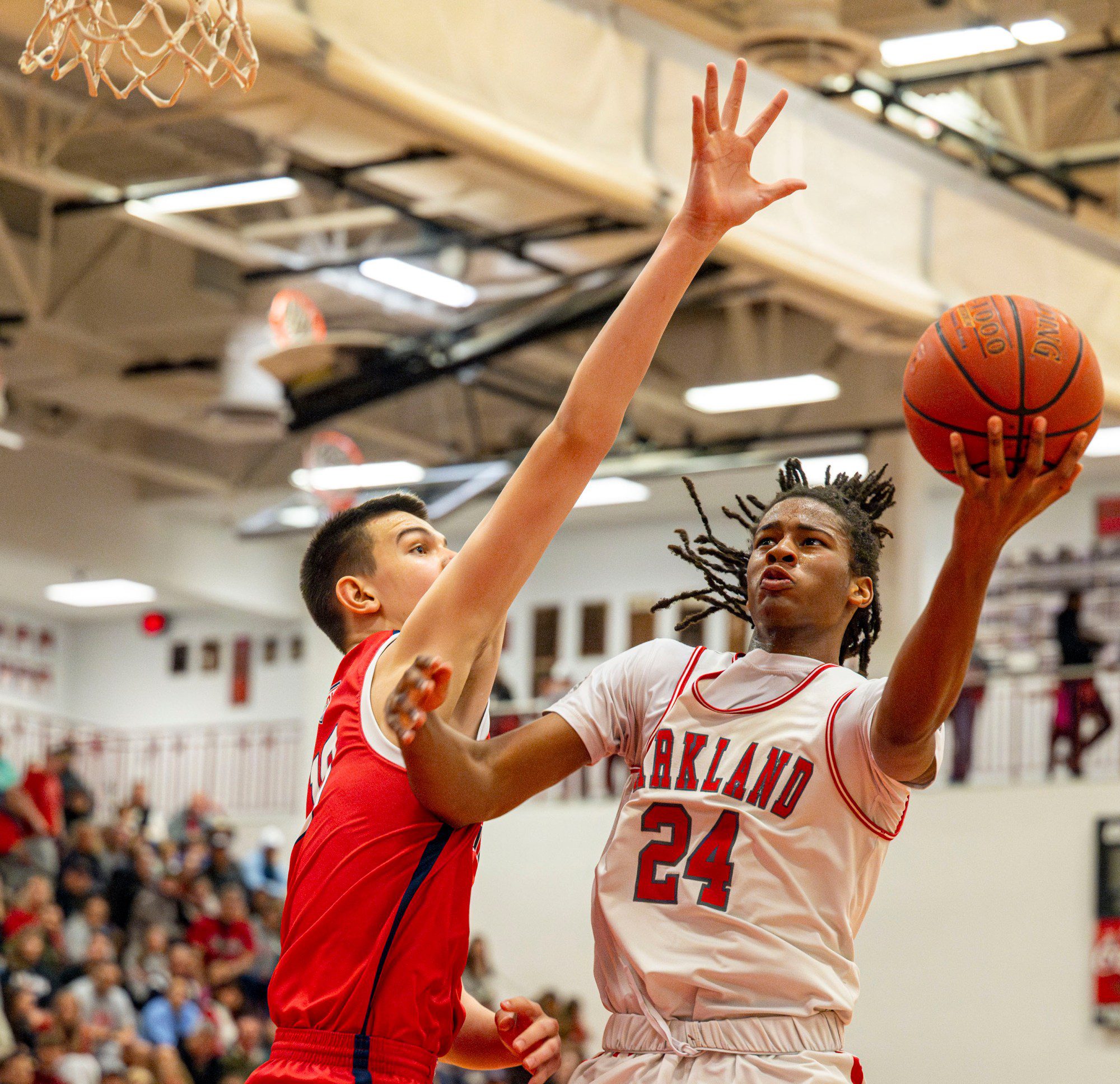 Parkland's Zaire Smaltz drives up the court against Plymouth-Whitemarsh's Michael Pereira during a PIAA Class 6A first round game Saturday, March 9, 2024, at Parkland High School. (April Gamiz/The Morning Call)