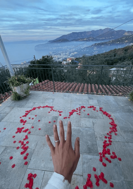 Bradley Riches' hand with engagement ring