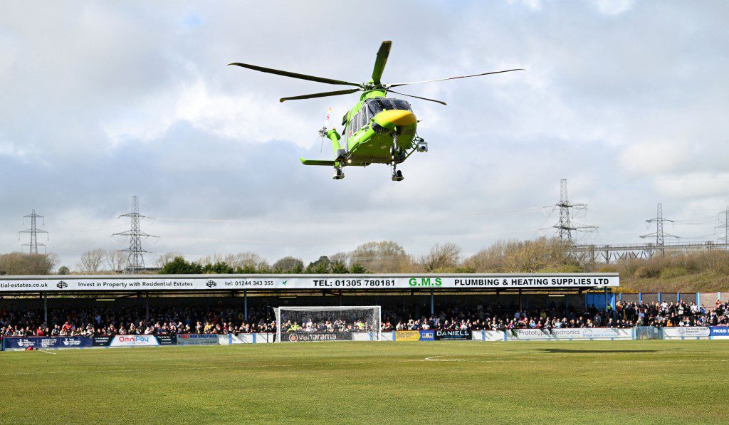 Mandatory Credit: Photo by MAT MINGO/PPA/Shutterstock (14413677ag) Air Ambulance had to land on pitch for Medical Emergency during the National League South match between Weymouth and Yeovil Town at Bob Lucas Stadium on 01st April 2024 in Weymouth, England - Photo by Mat Mingo/PPAUK Weymouth v Yeovil Town - Bob Lucas Stadium, Weymouth, UK - 01 Apr 2024