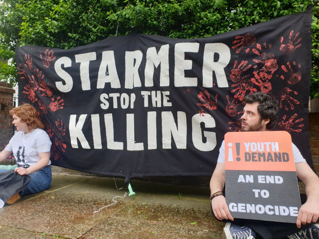 Handout photo issued by Youth Demand of their protest outside the London home of Labour leader Sir Keir Starmer. Issue date: Tuesday April 9, 2024. PA Photo. See PA story POLITICS Starmer. Photo credit should read: Youth Demand/PA Wire NOTE TO EDITORS: This handout photo may only be used in for editorial reporting purposes for the contemporaneous illustration of events, things or the people in the image or facts mentioned in the caption. Reuse of the picture may require further permission from the copyright holder.