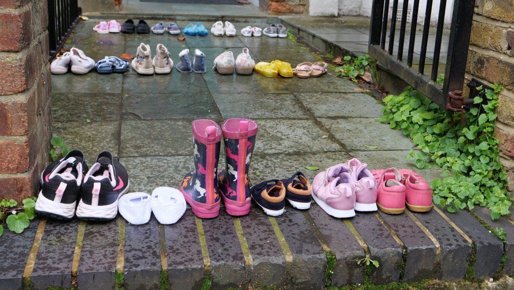 Protesters laid rows of children's shoes in front of the Labour leader's door to signify the children killed in Gaza (Picture: Youth Demand/PA Wire)