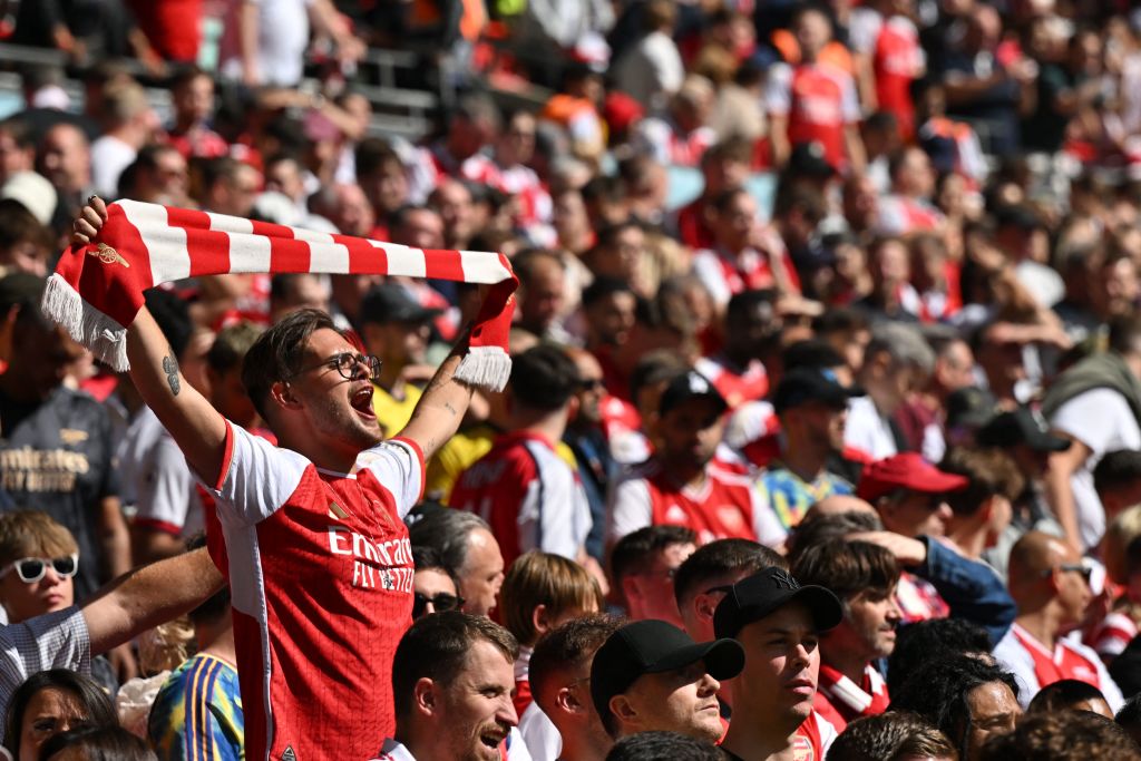 Arsenal fan sings before a game