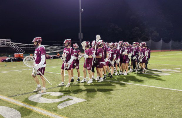 The Pottsgrove boys' lacrosse team lines up after its game at Methacton High School on Thursday, April 18, 2024. (MediaNews Group)