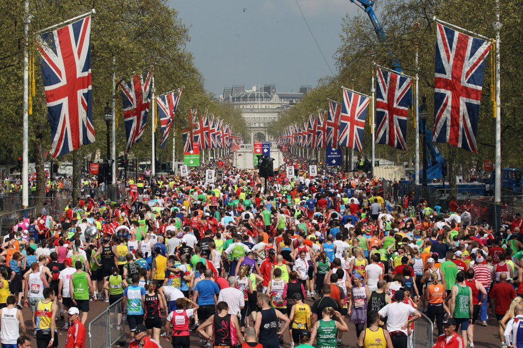 Runners finish the 2011 Virgin Money London Marathon on the Mall 