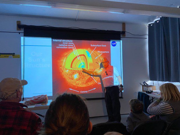 NASA expert Donald R. Miller explains what scientists know about the sun during a program at the Pottstown Regional Public Library March 26. (Evan Brandt -- MediaNews Group)