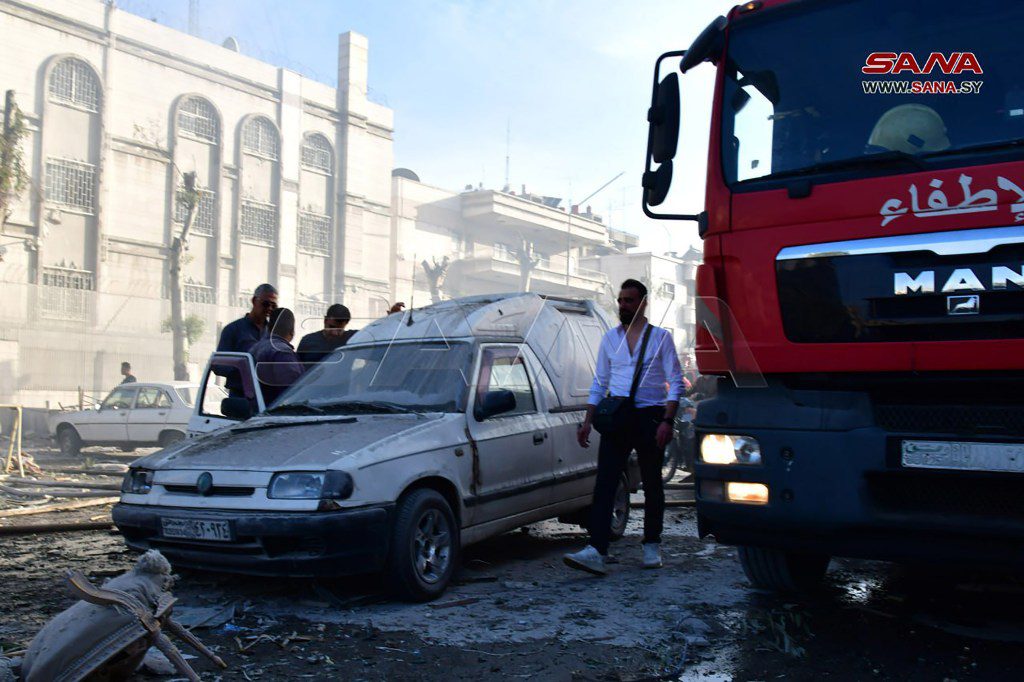 Emergency and security personnel inspect the rubble at the site of strikes which hit a building annexed to the Iranian embassy in Damascus (picture: Shutterstock)