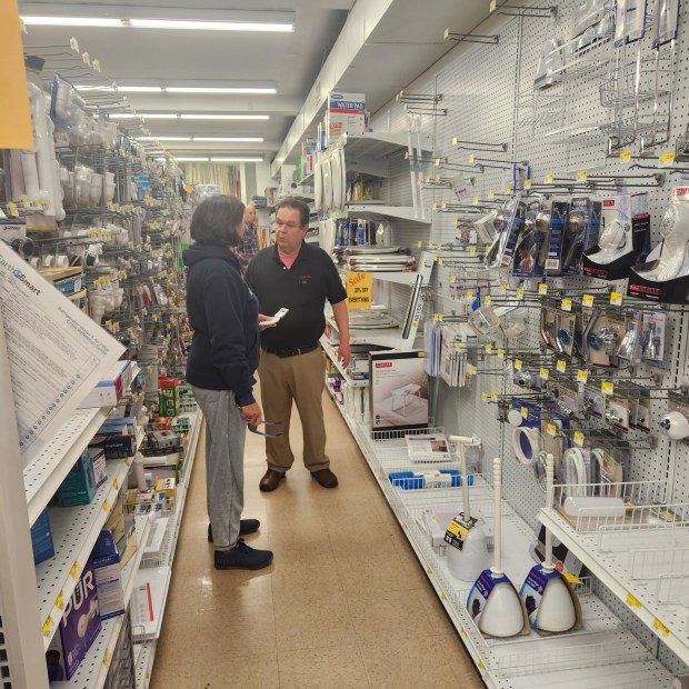 The Hardware Center employee Mike DiAndrea, right, helps a customer. (BILL RETTEW/MEDIANEWS GROUP)