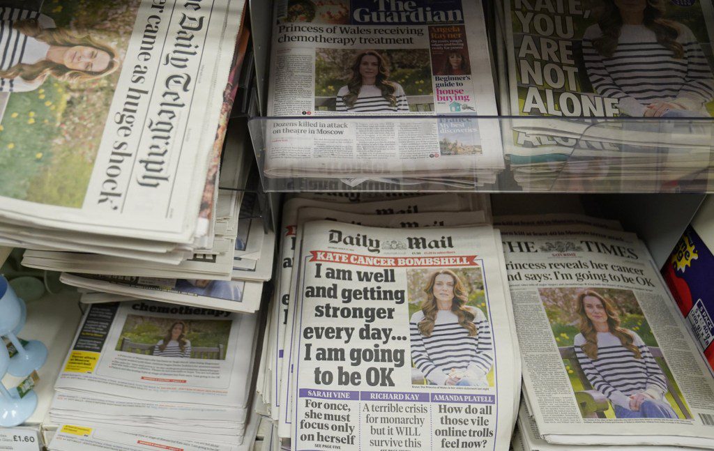 Front pages of national newspapers on display at a newsagents in north London showing the news of the Princess of Wales cancer diagnosis. Picture date: Saturday March 23, 2024. PA Photo. See PA story ROYAL Kate. Photo credit should read: Stefan Rousseau/PA Wire