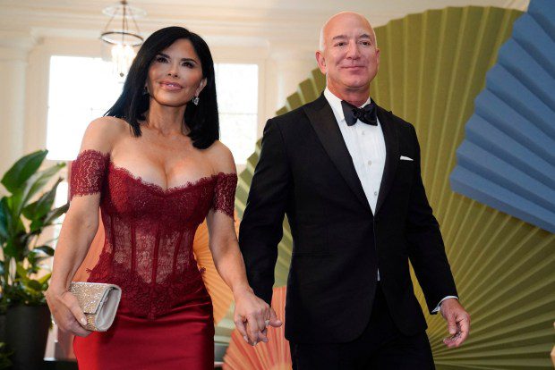 Executive chairman of Amazon Jeff Bezos and actress Lauren Sanchez arrive for a State Dinner in honor of Japanese Prime Minister Fumio Kishida, at the Booksellers Room of the White House in Washington, DC, on April 10, 2024. (Photo by Drew Angerer / AFP) (Photo by DREW ANGERER/AFP via Getty Images)