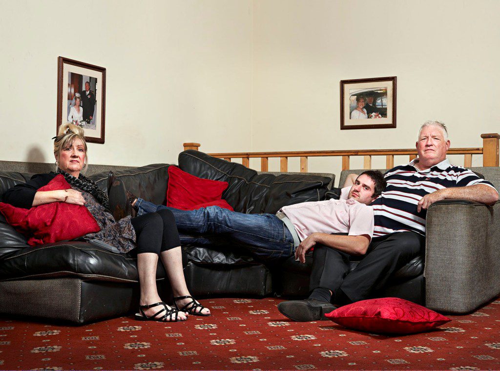 George Gilbey, centre, with his mother Linda and stepfather Pete McGarry.