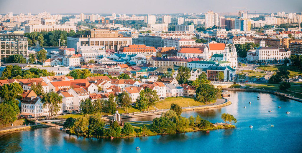 Aerial View, Cityscape Of Minsk, Belarus. Summer Season, Sunset Time. Panorama Of Nemiga District