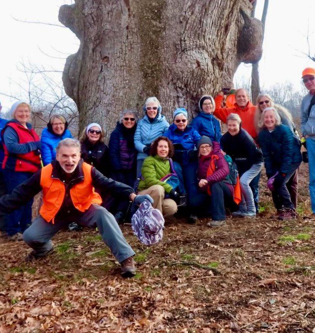 Nancy Seller, front and center in green jacket, on a hike with the Thursday Wanderers at an area near Warwick Furnace in Chester County. (Courtesy of Nancy Sellers)