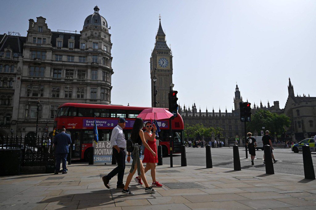 people enjoying the sun in westminster