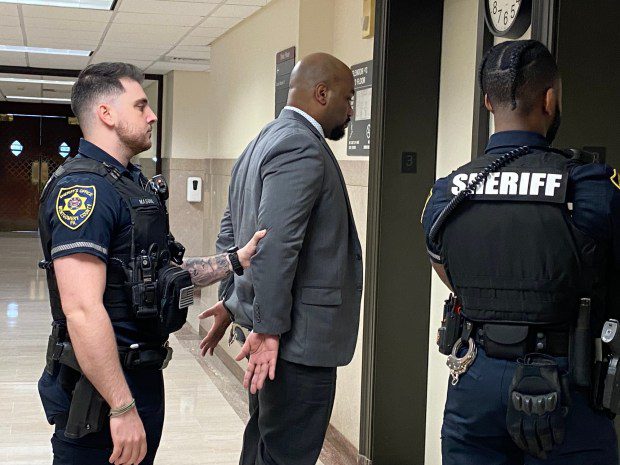 Sheriff's deputies escort Parnell Glover from a Montgomery County courtroom during a break at his trial on April 3, 2024. (Photo by Carl Hessler Jr. - MediaNews Group)