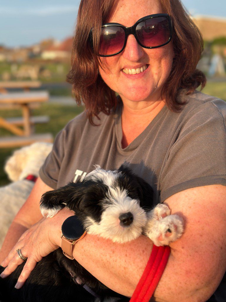 Nicola's best friend Natalie with her puppy Mabel during one of their socialising sessions at the pub 