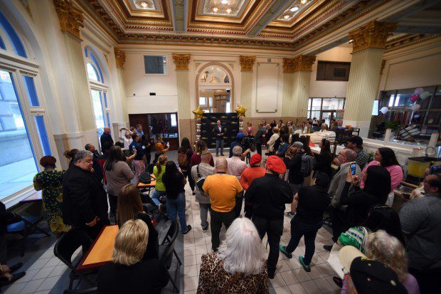 Alan Shuman welcomes gathered guests on Tuesday, April 23 to the grand opening of the food court in the renovated bank in the Reading's Central Business District building. (BILL UHRICH - MEDIANEWS GROUP)